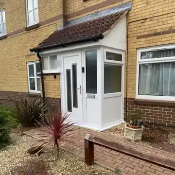 A white uPVC porch fitted